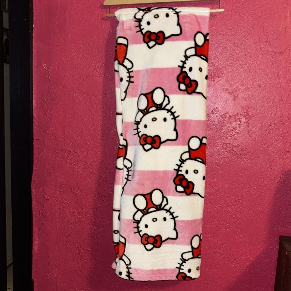 NWT Hello Kitty bows and stripes silk touch throw Blanket. 50 in by 70 inch.